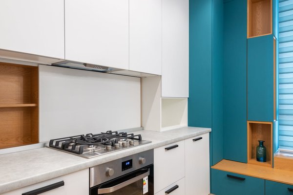 What safety features should you look for in an electric oven?